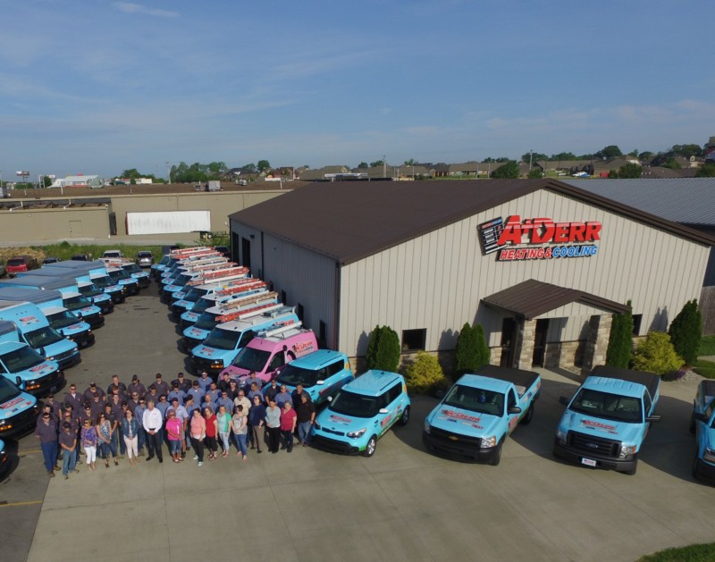 A+ Derr service vans and staff in front of their Evansville location