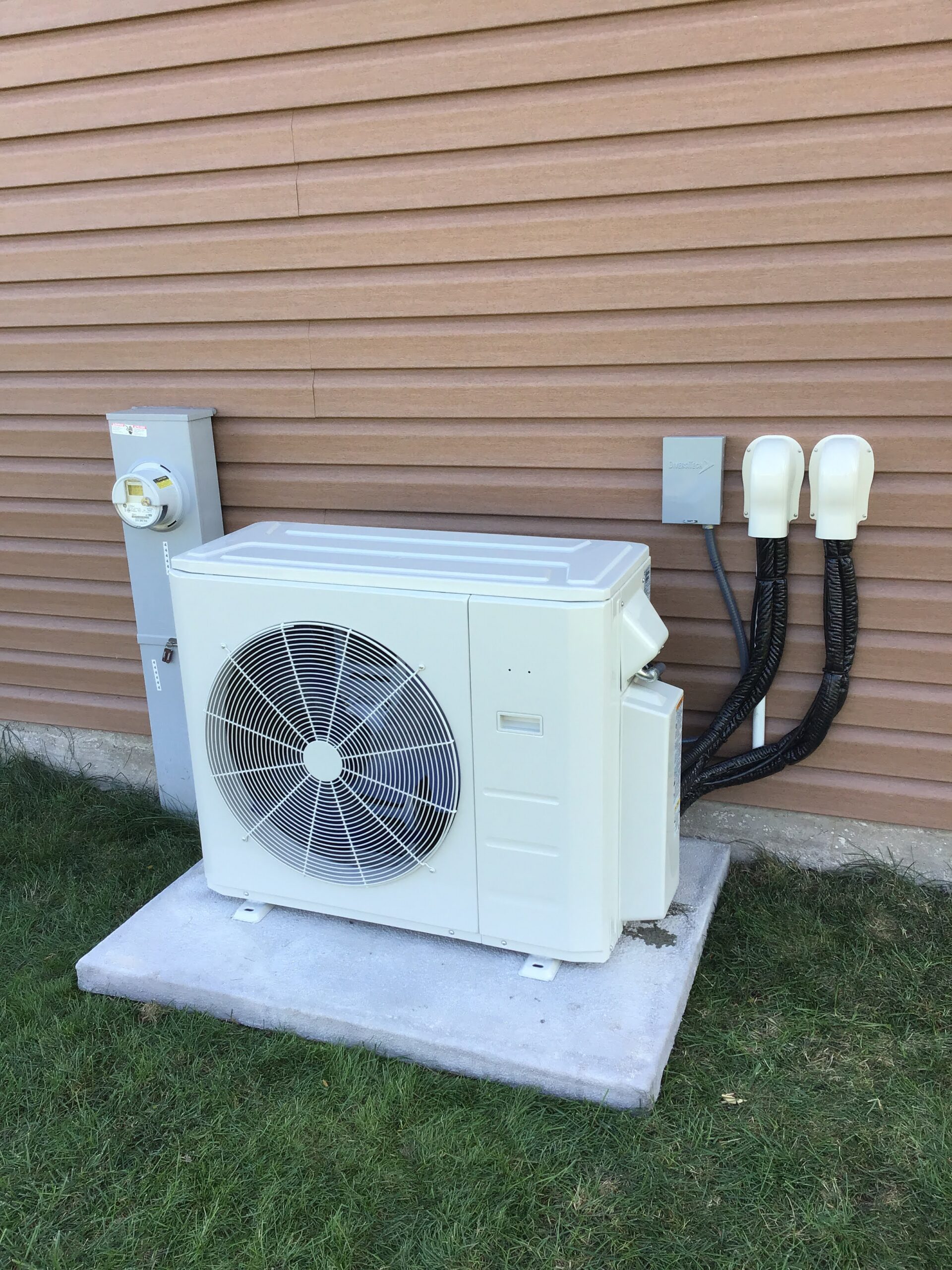 Ductless AC unit located outside of house